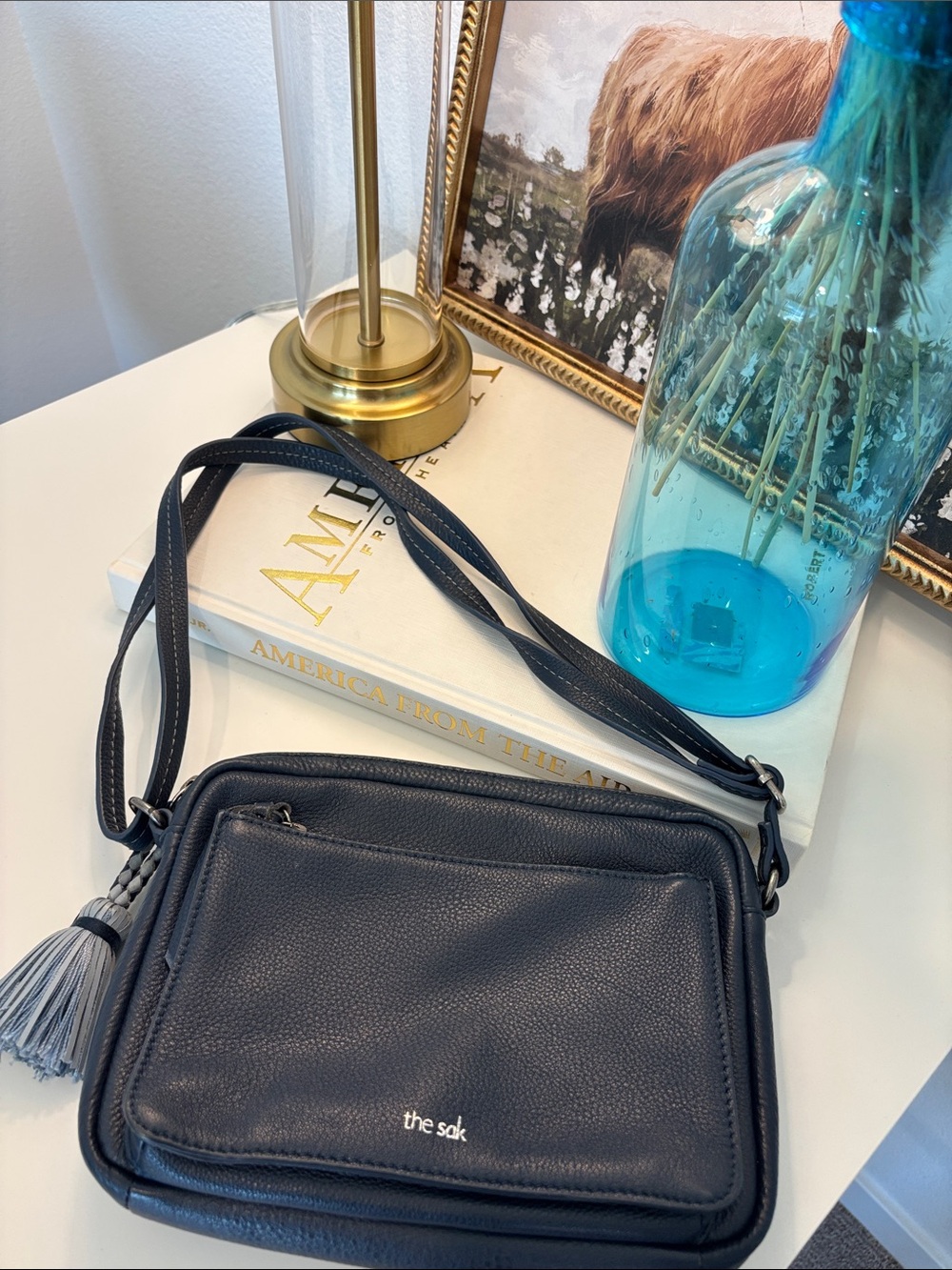 The Sak Navy Pebbled Leather Crossbody Bag with Tassel